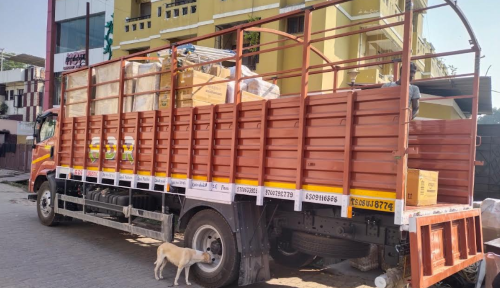 A truck of Speed Cargo packers and movers in Ayodhya is loaded with packed furniture 